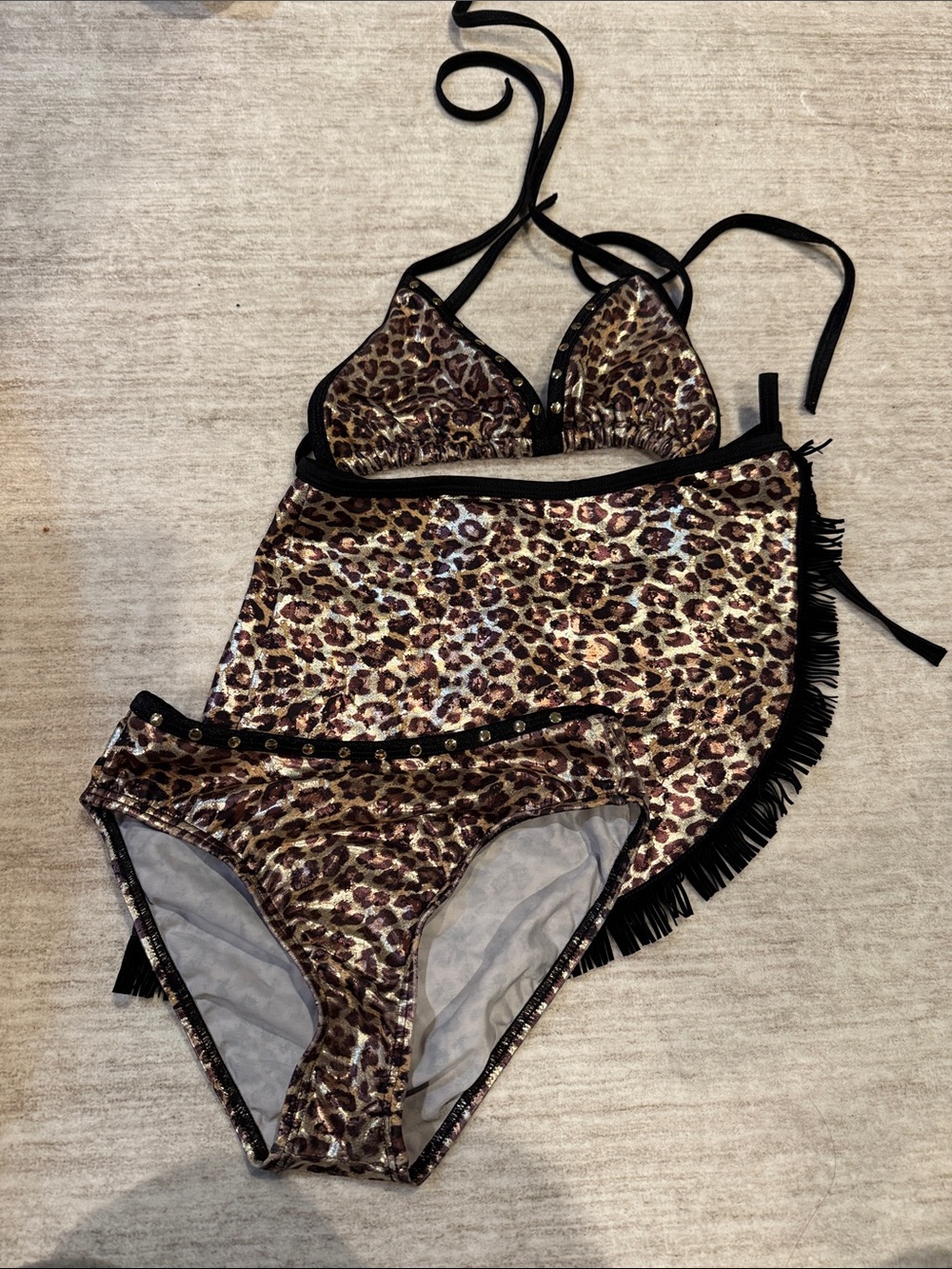 Bikini 3 piece set.  Size ten girls Leopard Print Bikini Set with Fringe Skirt.